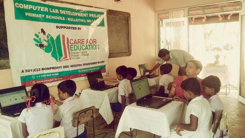 Care for Education - Children with Laptop