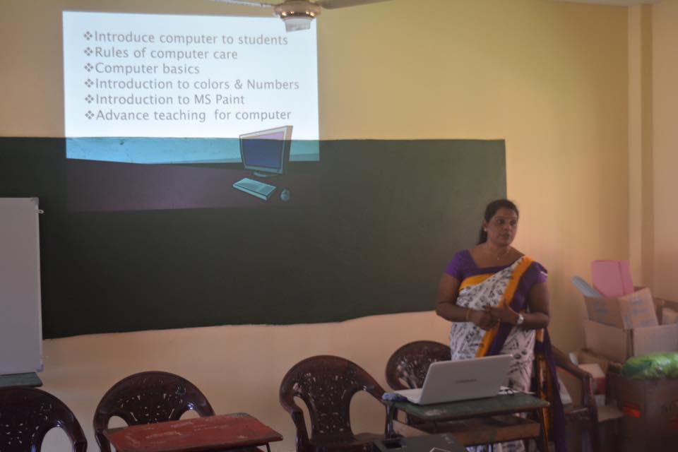 Care for Education - Children with Laptop