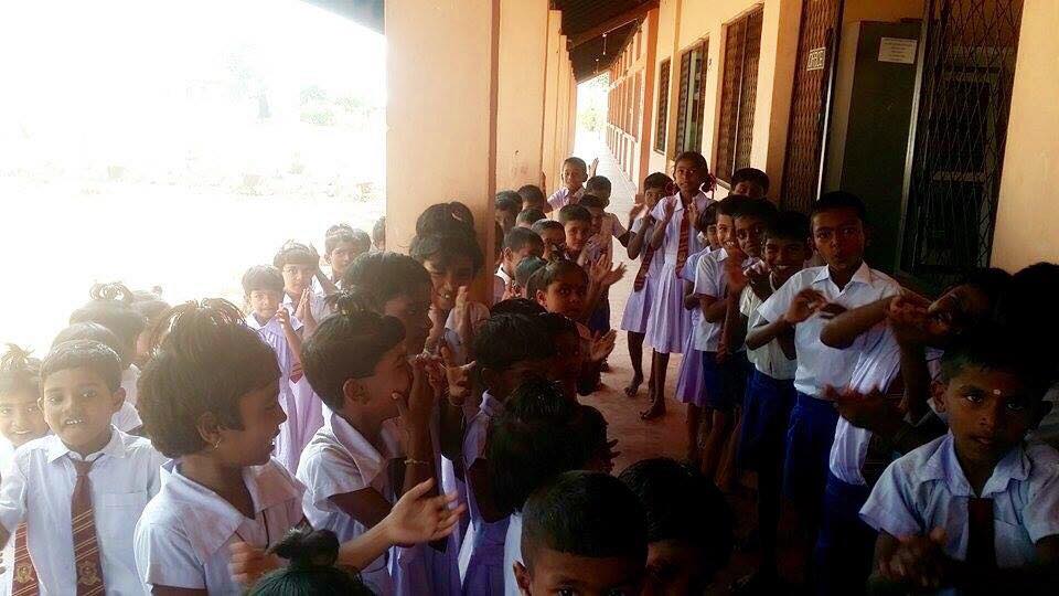 Care for Education - Children with Laptop