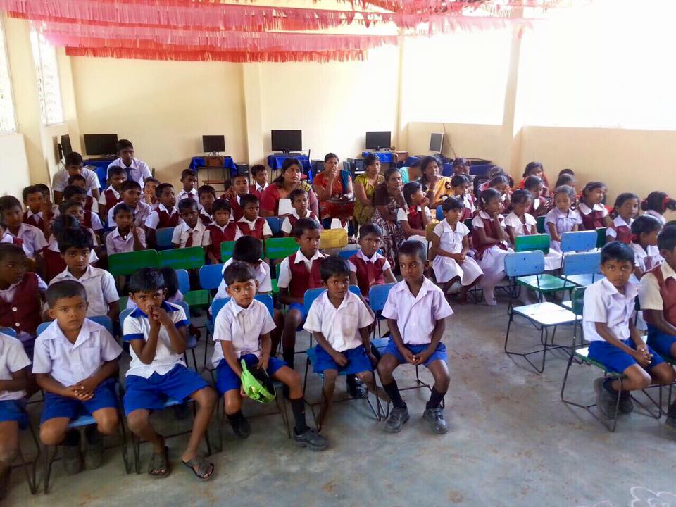 Care for Education - Children with Laptop