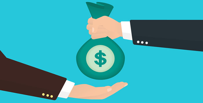 Businessman takes bag of money from another businessman.